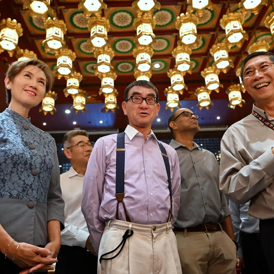 (From left) Minister for Communications and Information Josephine Teo, Japan Minister for Digital Transformation Kono Taro and deputy executive director of Buddha Tooth Relic Temple Ee Tiang Hwee.