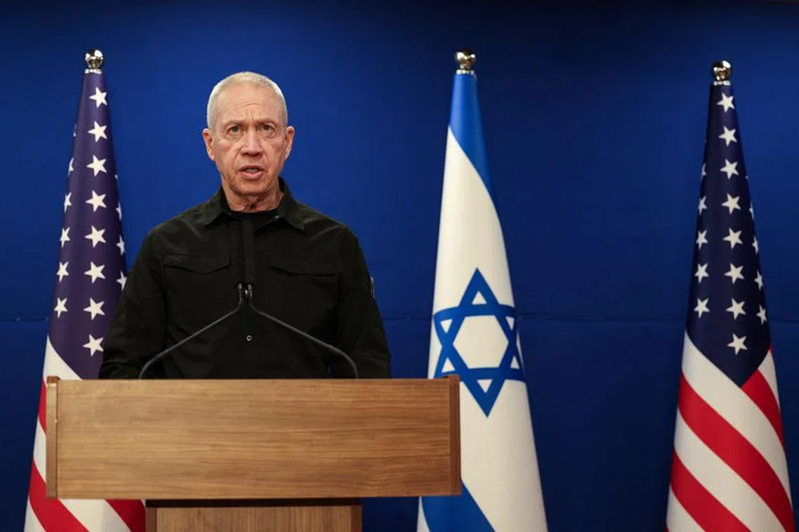 Israeli Defense Minister Yoav Gallant speaks during a joint press conference with U.S. Secretary of Defense Lloyd Austin at Israel's Ministry of Defense in Tel Aviv, Israel December 18, 2023. REUTERS/Violeta Santos Moura