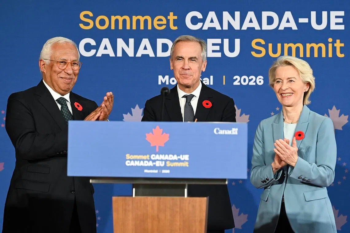 (From left) European Council President Antonio Costa, Canadian Prime Minister Mark Carney and European Commission President Ursula von der Leyen celebrating the alliance between Canada and the EU at a summit in Montreal, Canada, on Oct 30.