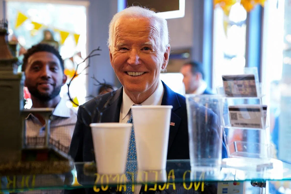 FILE PHOTO: U.S. President Joe Biden visits BMore Licks for icecream during a visit in Baltimore, Maryland, U.S., October 29, 2024. REUTERS/Elizabeth Frantz/File Photo