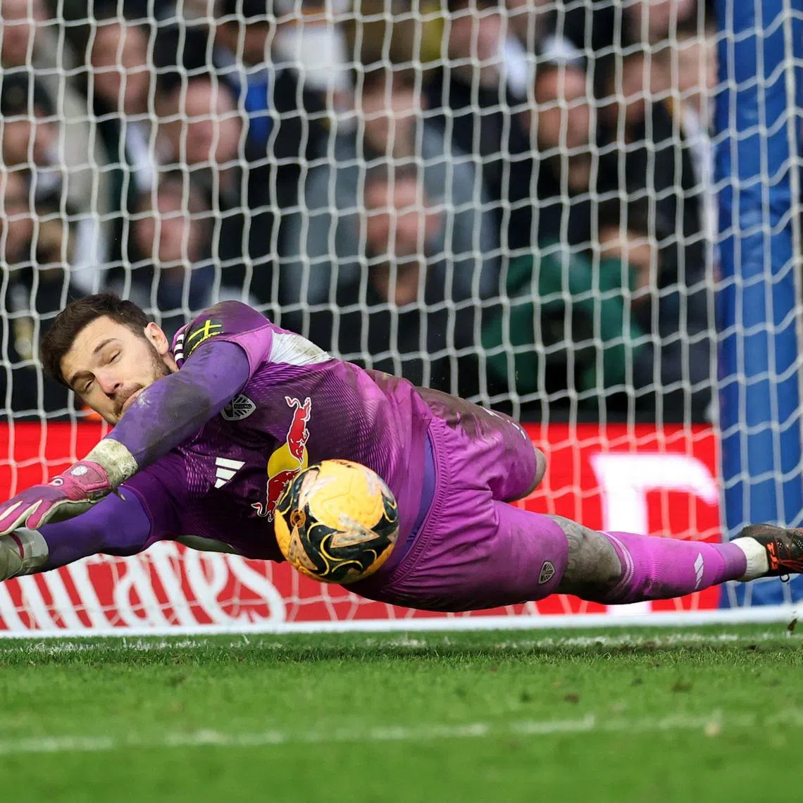 Soccer Football -  FA Cup - Fourth Round - Birmingham City v Leeds United - St Andrew's @ Knighthead Park, Birmingham, Britain - February 15, 2026 Leeds United's Lucas Perri saves a penalty during the penalty shootout Action Images via Reuters/Andrew Boyers