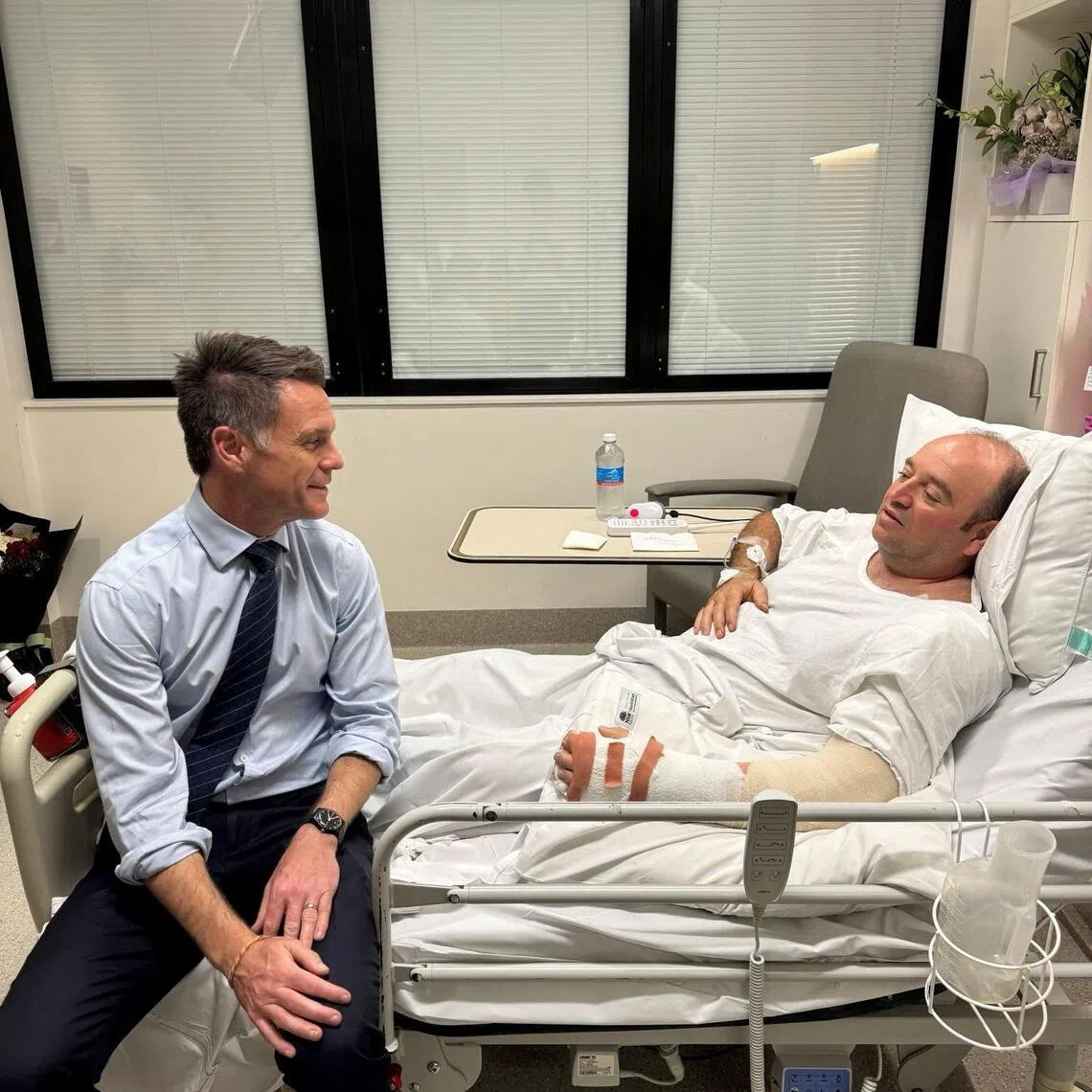 New South Wales Premier Chris Minns visits Mr Ahmed al Ahmed, a bystander who disarmed one of the Bondi Beach shooters, at a hospital in Sydney, Australia, Dec 15.