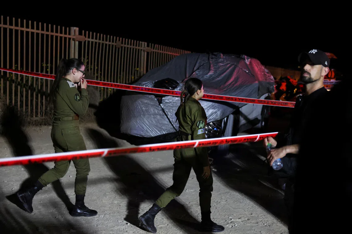 Israeli security forces gather after Israel's military said that they were employing all means available to locate resigned Chief Military Advocate General, Major General Yifat Tomer-Yerushalmi, who resigned on Friday over a criminal inquiry into the leaking of a video that appeared to show soldiers abusing a Palestinian detainee arrested during the Gaza war, in Herzliya, Israel November 2, 2025. REUTERS/Nir Elias