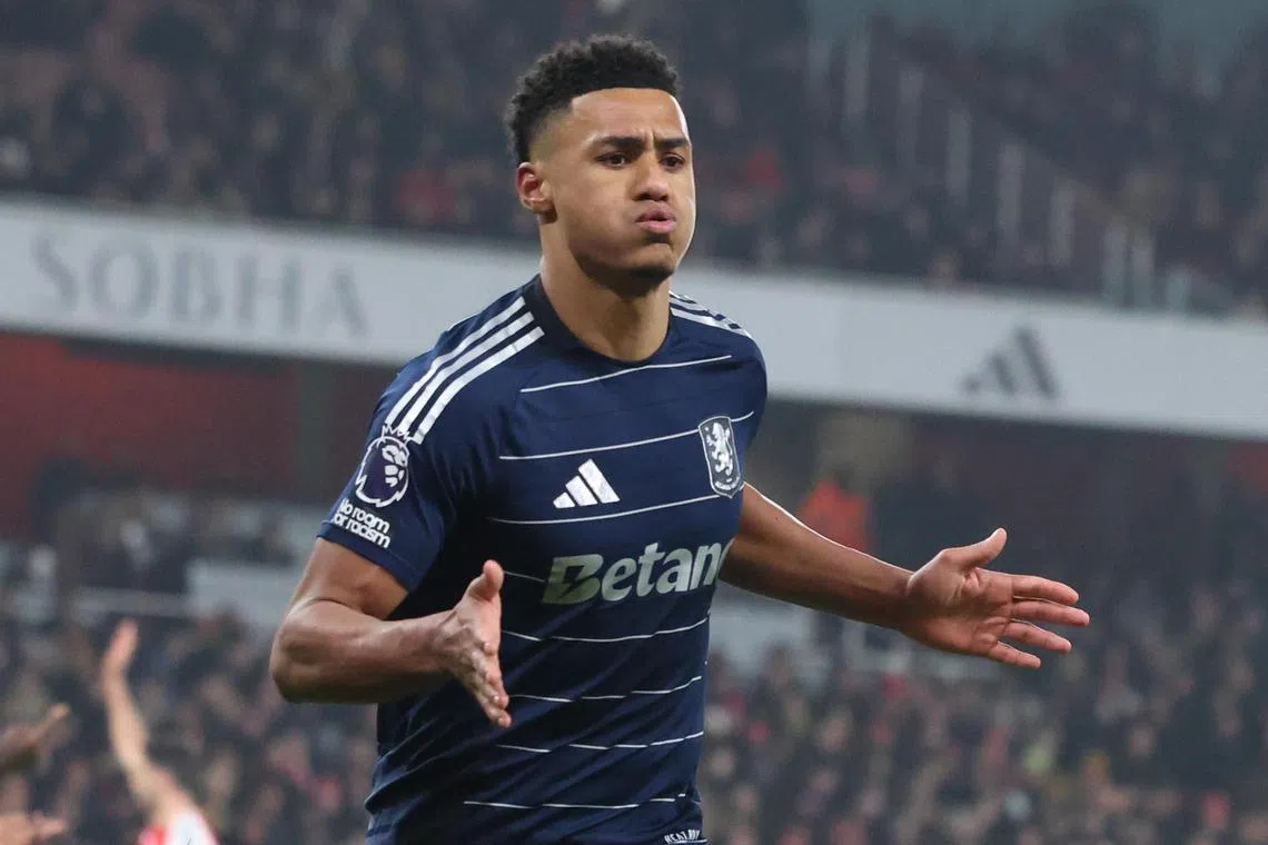 Villa's Ollie Watkins celebrates after scoring the 2-2 equaliser against Arsenal.
