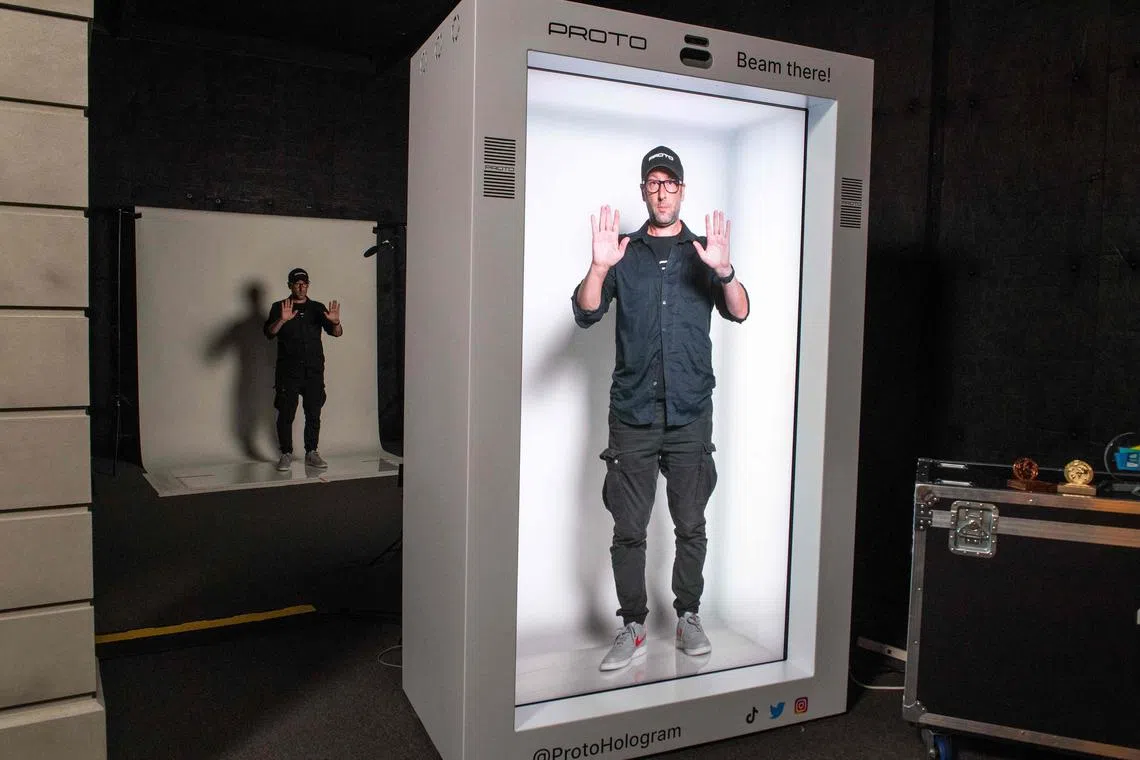 David Nussbaum, Founder and CEO of Porto Hologram, demonstrates how the hologram technology works, in Van Nuys, California, on August 1, 2023. 