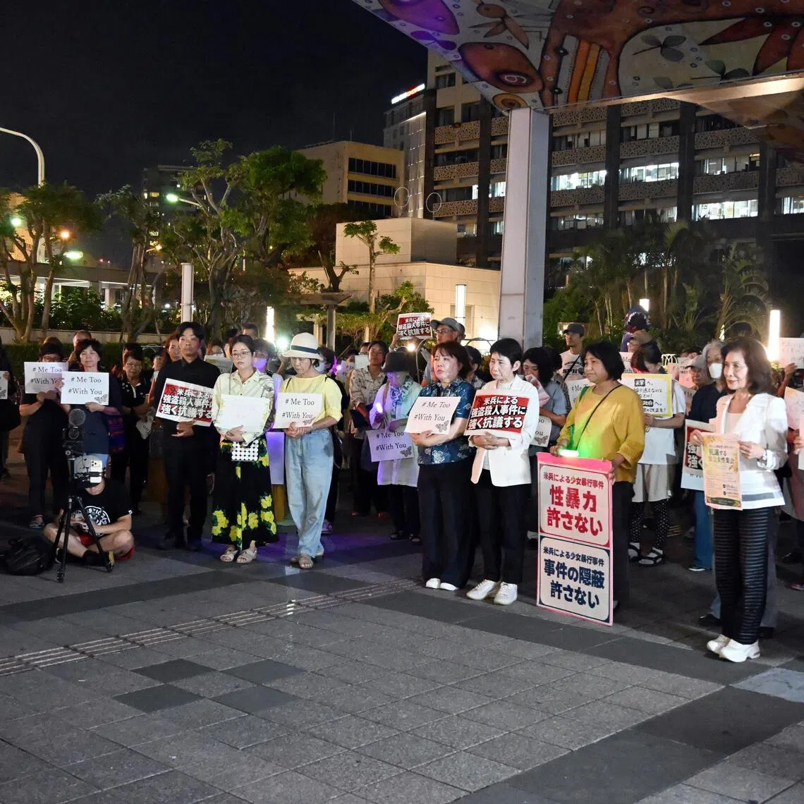 People attend a rally in protest against the US Marine robbery-murder case, on Oct 4.