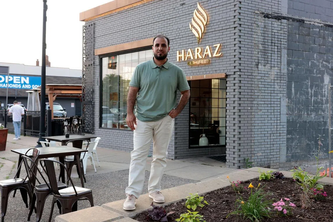 Hamzah Nasser, CEO of Haraz Coffee House, poses outside the coffee house on June 18 in Dearborn, Michigan. The town of Dearborn is a cultural hub for Arab Americans and could play a decisive role in deciding the fate of the battleground state in November’s presidential election.