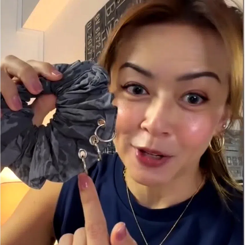 (From left) Singaporean actress Pam Oei with a BTS light stick and a photo of BTS member Jimin, and Melody Chen unboxing BTS merchandise.