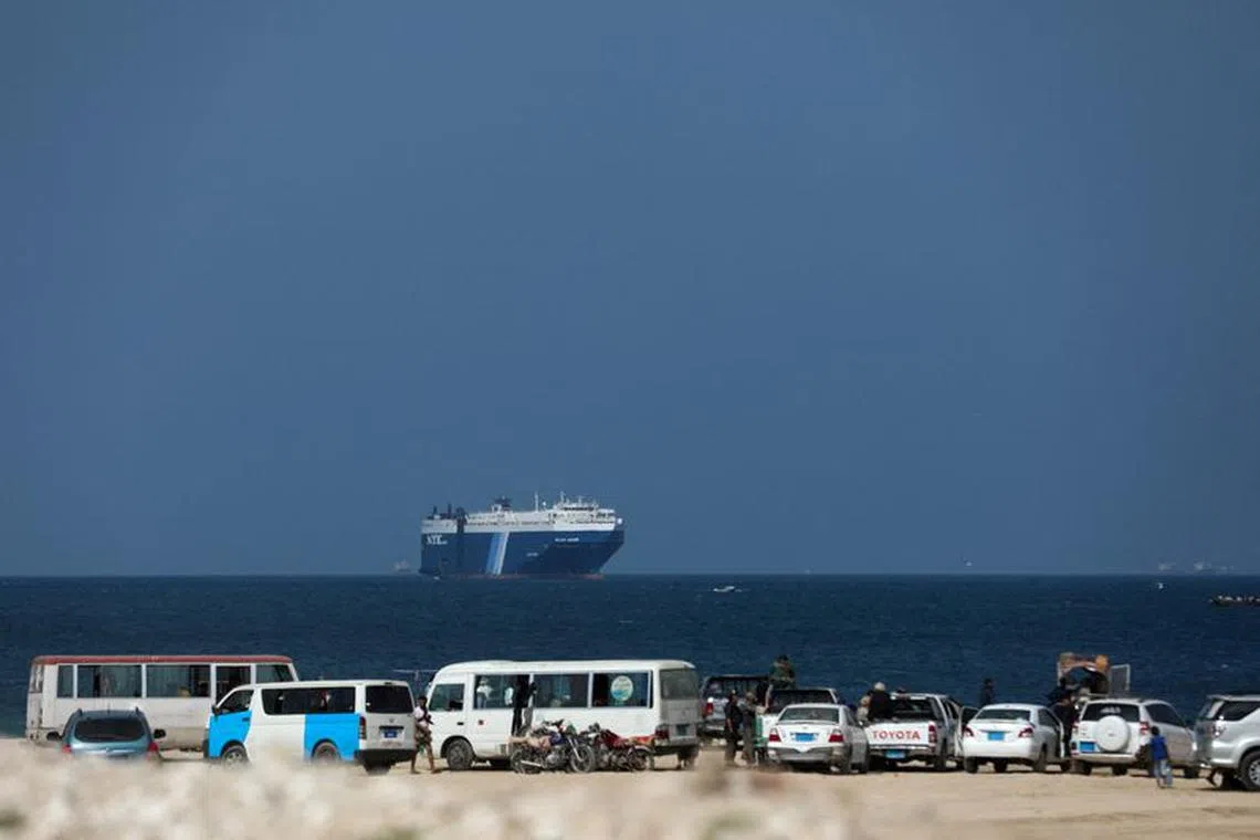 The Galaxy Leader commercial ship, seized by Yemen's Houthis last month, is seen off the coast of al-Salif, Yemen, December 5, 2023. REUTERS/Khaled Abdullah/File Photo