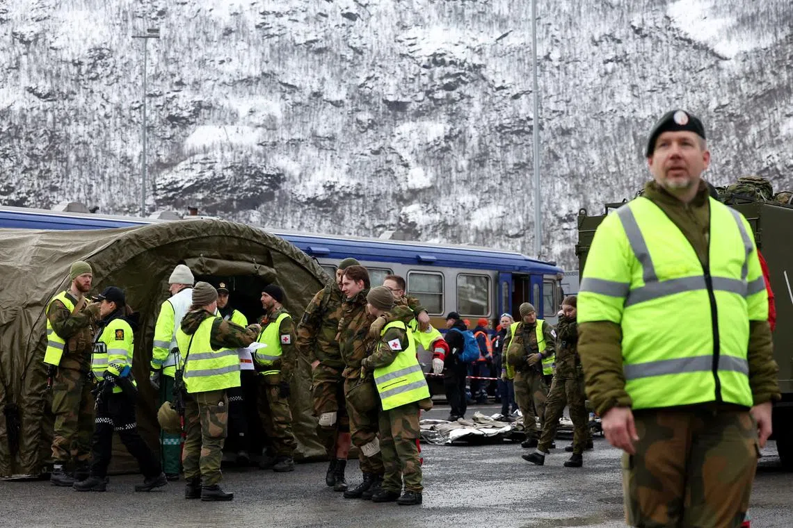 Soldiers and civilian health personnel take part in a healthcare drill during the NATO Cold Response 2026 military exercise in Narvik, Norway, March 12, 2026. REUTERS/Bernadett Szabo