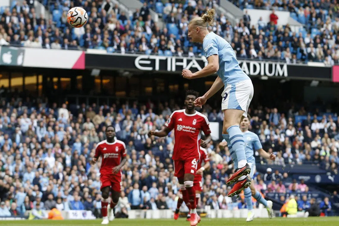 Manchester City's Erling Haaland scoring the second goal in their Premier League clash with Nottingham Forest.