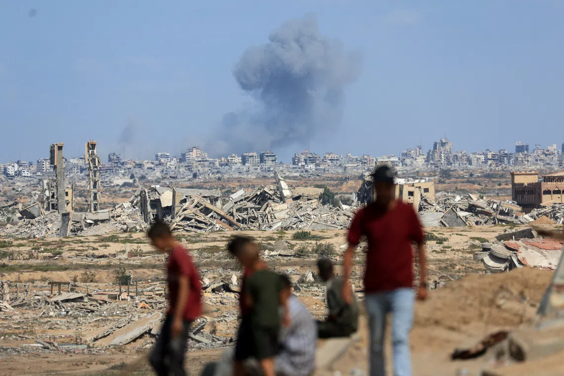 Smoke rises following explosions amid the Israeli military offensive in Gaza City, as seen from the central Gaza Strip, October 6, 2025. REUTERS/Dawoud Abu Alkas