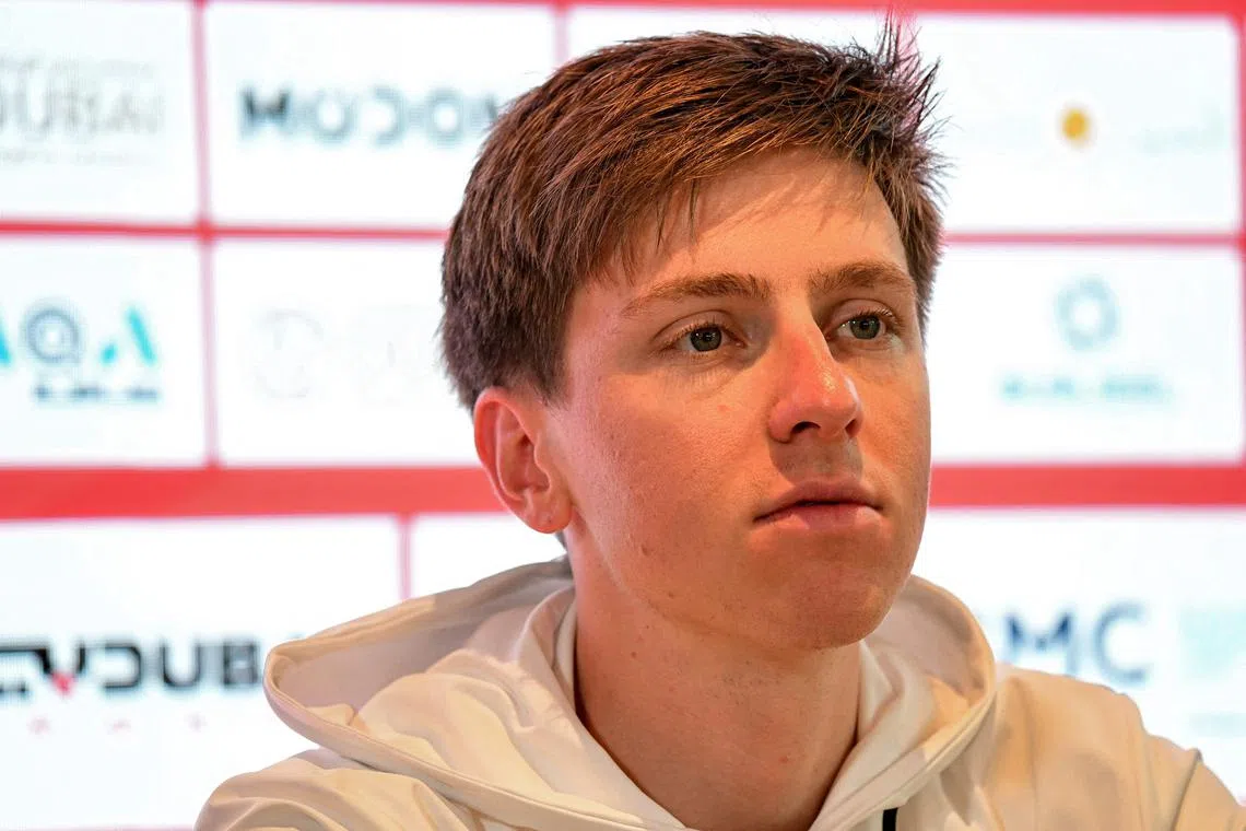 UAE Team Emirates' Slovenian rider Tadej Pogacar attending a press conference on the eve of the UAE Tour cycling race at the Colnago shop in Abu Dhabi on Feb 16, 2025.