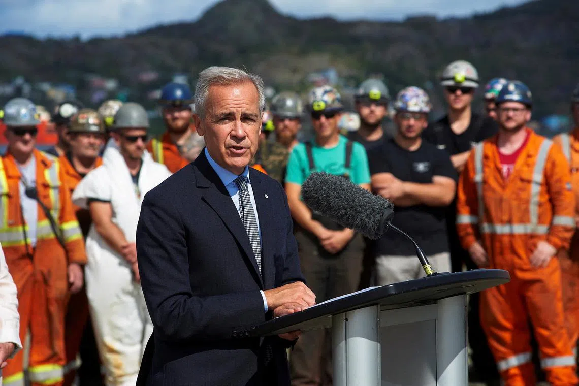 Canadian Prime Minister Mark Carney speaks at the Newdock shipyard in St. John's, Newfoundland, Canada September 8, 2025. REUTERS/Greg Locke/File Photo