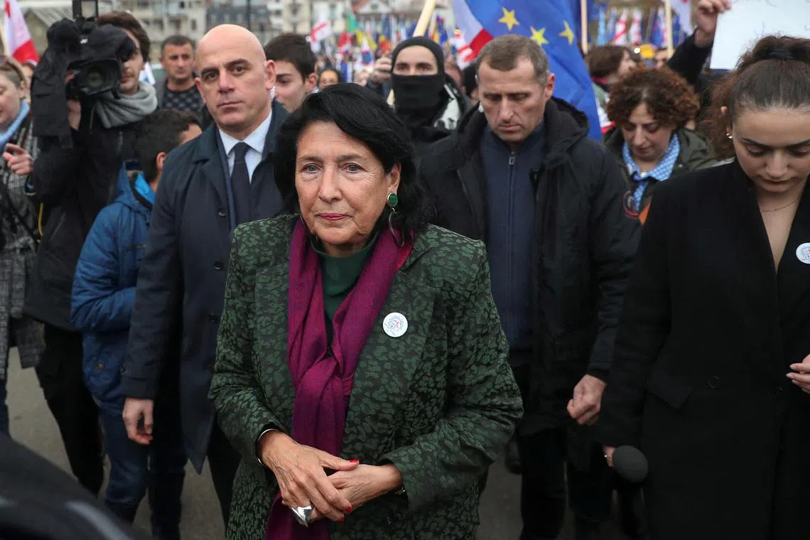 FILE PHOTO: Participants, including Georgia's President Salome Zourabichvili, walk during a procession in support of the country's membership in the European Union in Tbilisi, Georgia, December 9, 2023. REUTERS/Irakli Gedenidze/File Photo