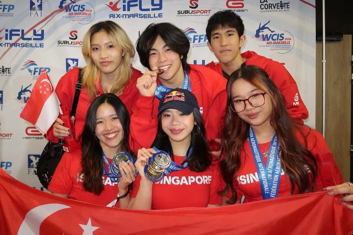 (From left, clock-wise) Singapore's Isabelle Koh, Kai Minejima-Lee, Jordan Lee, Vera Poh, Kyra Poh and Choo Yi Xuan posing with their medals won at the FAI World Cup of Indoor Skydiving.