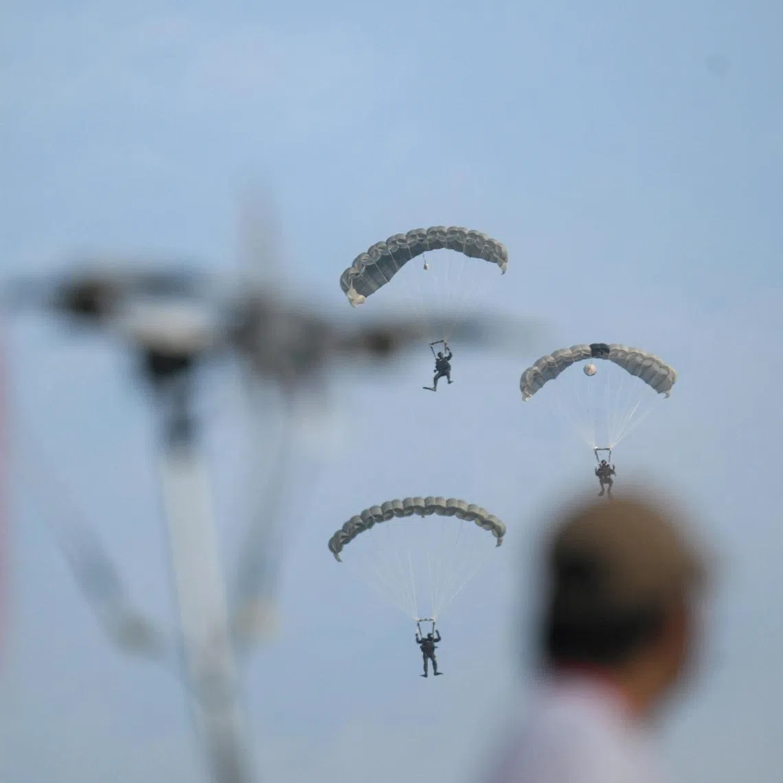 Naval divers performing the inaugural Jump of Unity, a new offering in the pre-parade segment for National Day Parade (NDP) 2025, at the National Education (NE) Show 2 on July 5.