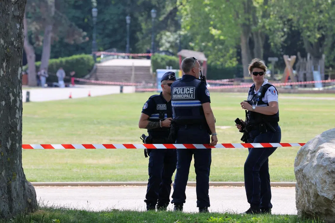 French police securing the site of a knife attack at a park in  Annecy, in the French Alps, on June 8.