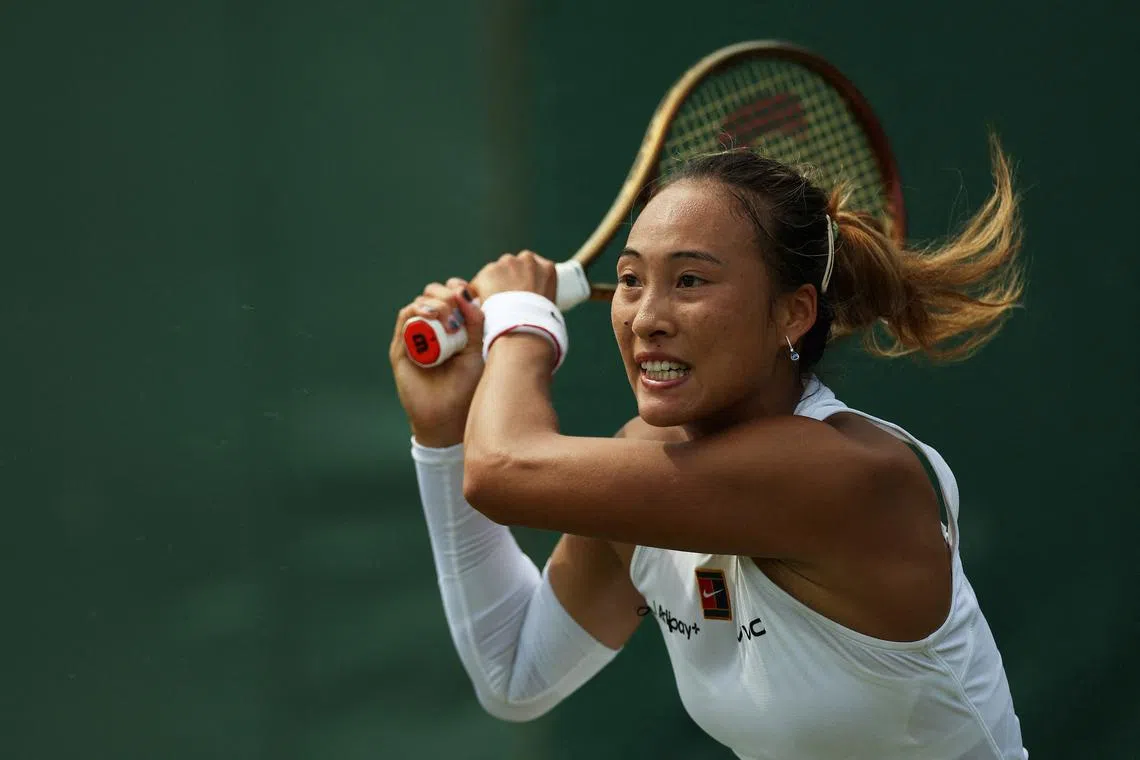 FILE PHOTO: Tennis - Wimbledon - All England Lawn Tennis and Croquet Club, London, Britain - July 1, 2025 China's Qinwen Zheng in action during her first round match against Czech Republic's Katerina Siniakova REUTERS/Isabel Infantes/File Photo