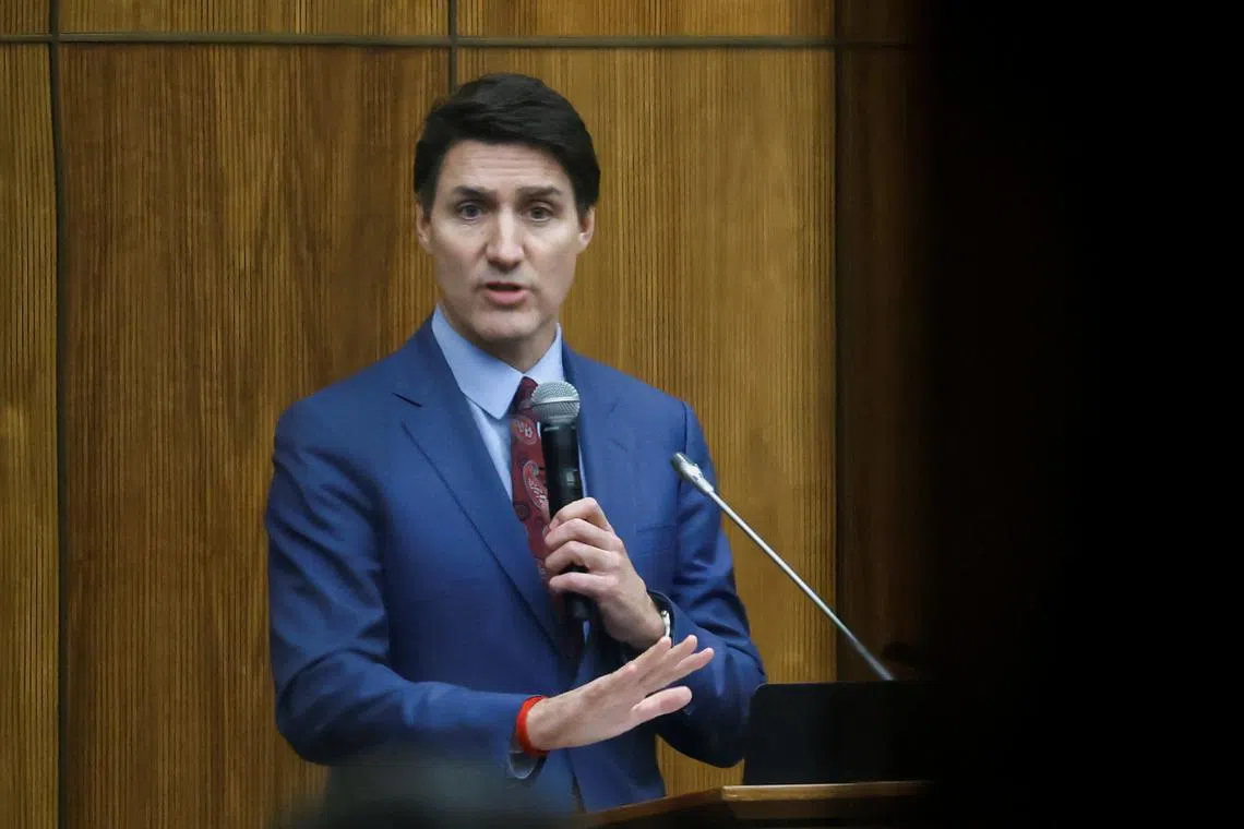 FILE PHOTO: Canada's Prime Minister Justin Trudeau addresses the Liberal party caucus meeting in Ottawa, Ontario, Canada December 16, 2024. REUTERS/Blair Gable/File Photo