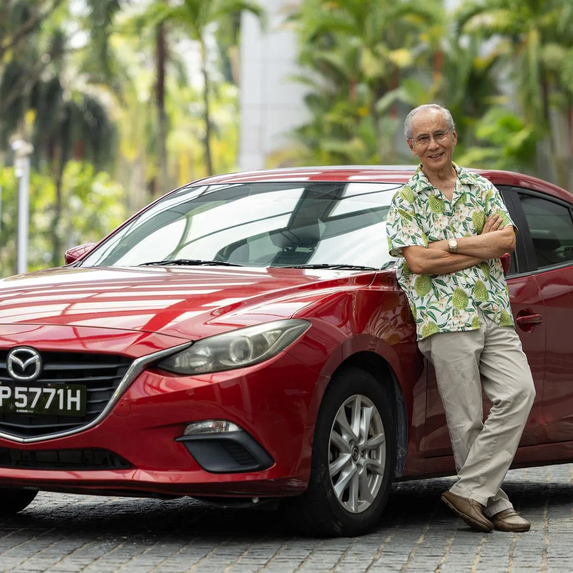 Profile of Mr Danny Yeo, 75, retiree, with his car.