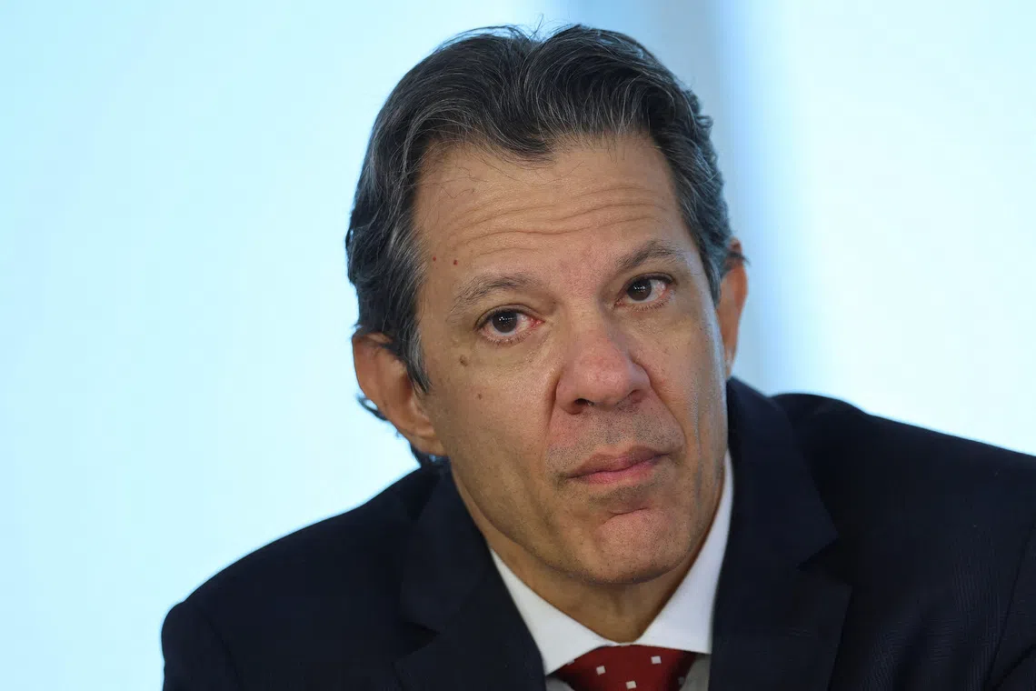 Brazil's Finance Minister Fernando Haddad attends a ceremony to announce the new credit line for Brazilian Industry at the Planalto Palace, in Brasilia, Brazil, August 25, 2025. REUTERS/Adriano Machado