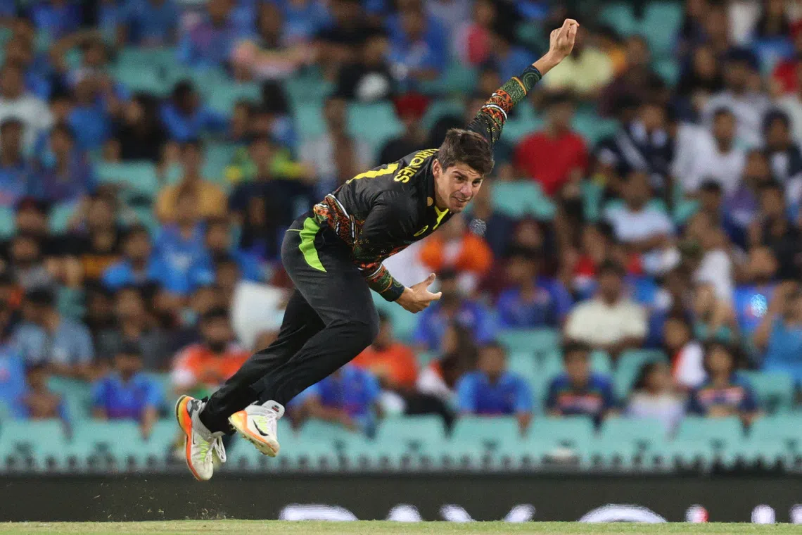 FILE PHOTO: Cricket - Second Twenty20 International - Australia v India - Sydney Cricket Ground, Sydney, Australia - December 6, 2020 Australia's Moises Henriques in action REUTERS/Loren Elliott/ File photo