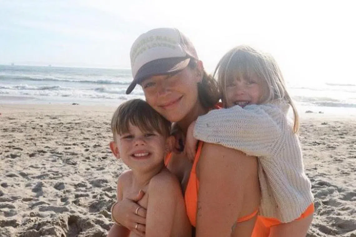 Influencer Avery Woods with her older son and younger daughter.