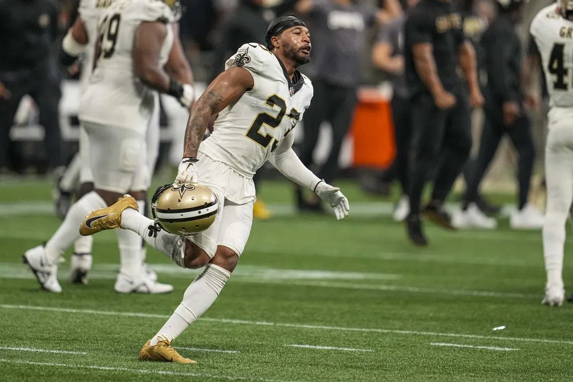 Sep 11, 2022; Atlanta, Georgia, USA; New Orleans Saints cornerback Marshon Lattimore (23) reacts after the Saints defeated the Atlanta Falcons at Mercedes-Benz Stadium. Mandatory Credit: Dale Zanine-USA TODAY Sports/ File Photo