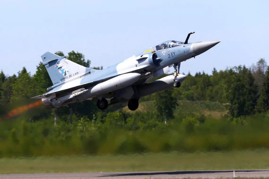 FILE PHOTO: France's Air Force Mirage 2000-5 fighter takes off during the NATO Baltic Air Policing Mission in Amari military air base, Estonia May 25, 2018. REUTERS/Ints Kalnins/File Photo
