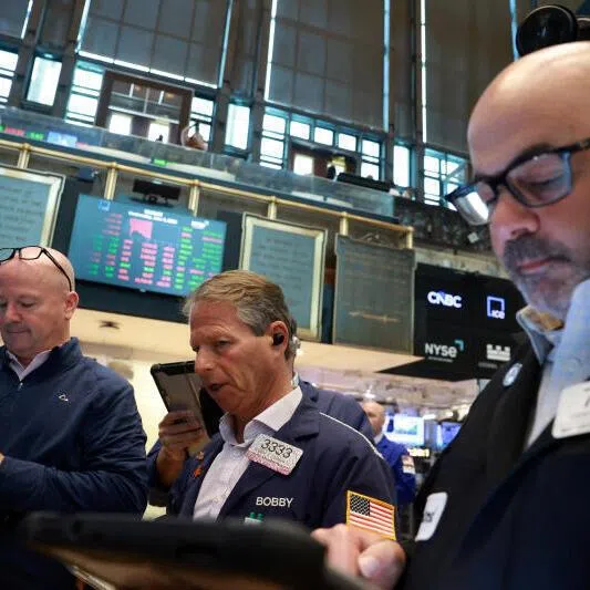 Traders work on the floor at the New York Stock Exchange in New York City, on June 3, 2026.