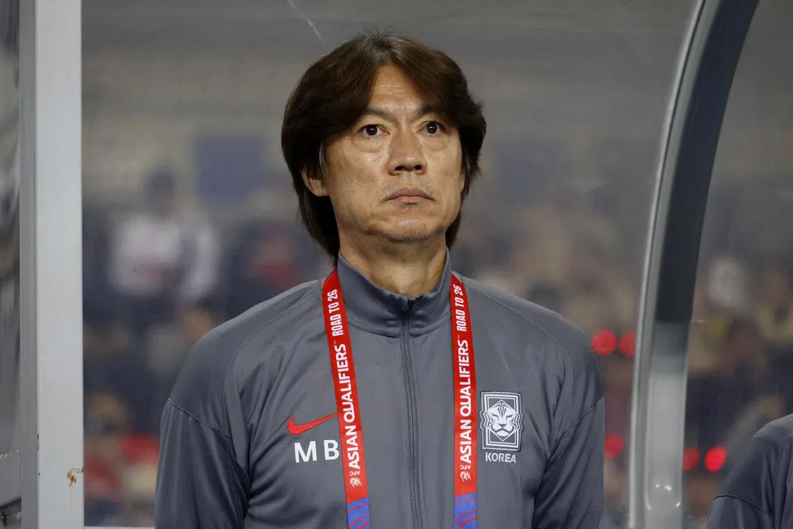 FILE PHOTO: Soccer Football - World Cup - Asian Qualifiers - Third Round - Group B - South Korea v Iraq - Yongin Mireu Stadium, Yongin, South Korea - October 15, 2024 South Korea coach Myung-Bo Hong lines up during the national anthems before the match REUTERS/Kim Soo-Hyeon/File Photo