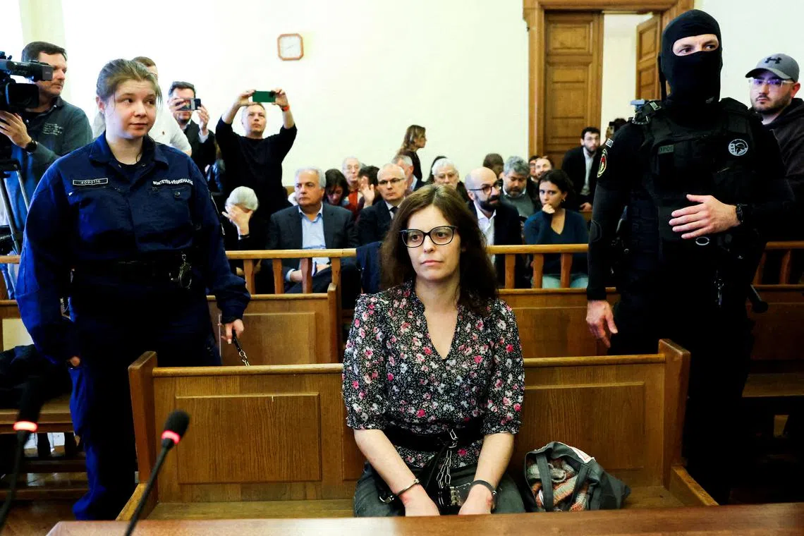 FILE PHOTO: Italian teacher Ilaria Salis, facing charges for taking part in an anti-fascist assault on far-right activists, appears in a court, in Budapest, Hungary, March 28, 2024. REUTERS/Bernadett Szabo/File Photo