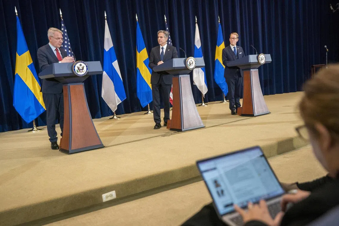 Finnish Foreign Minister Pekka Haavistoat  (left), with US Secretary of State Antony Blinken (centre) and Swedish Foreign Minister Tobias Billstrom, address the media, in Washington, on Dec 8, 2022.