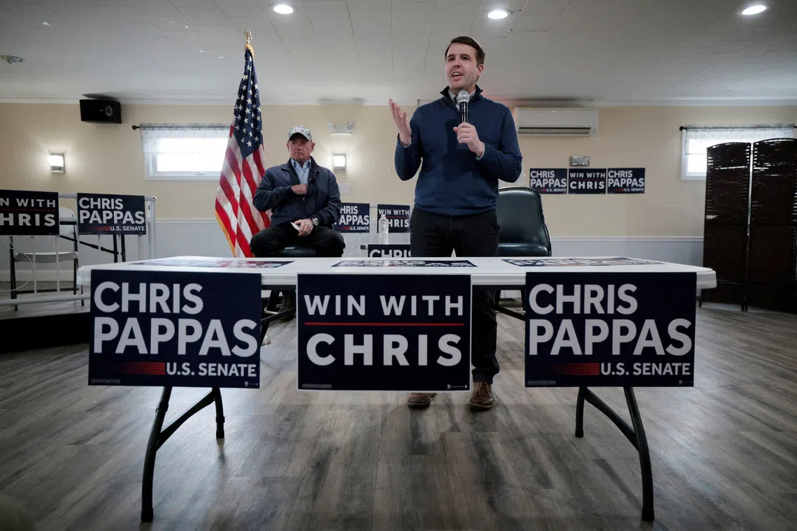 FILE PHOTO: U.S. Representative and Democratic candidate for the U.S. Senate Chris Pappas is joined by U.S. Senator Mark Kelly while campaigning at the VFW Post in Derry, New Hampshire, U.S., March 20, 2026.   REUTERS/Brian Snyder/File Photo