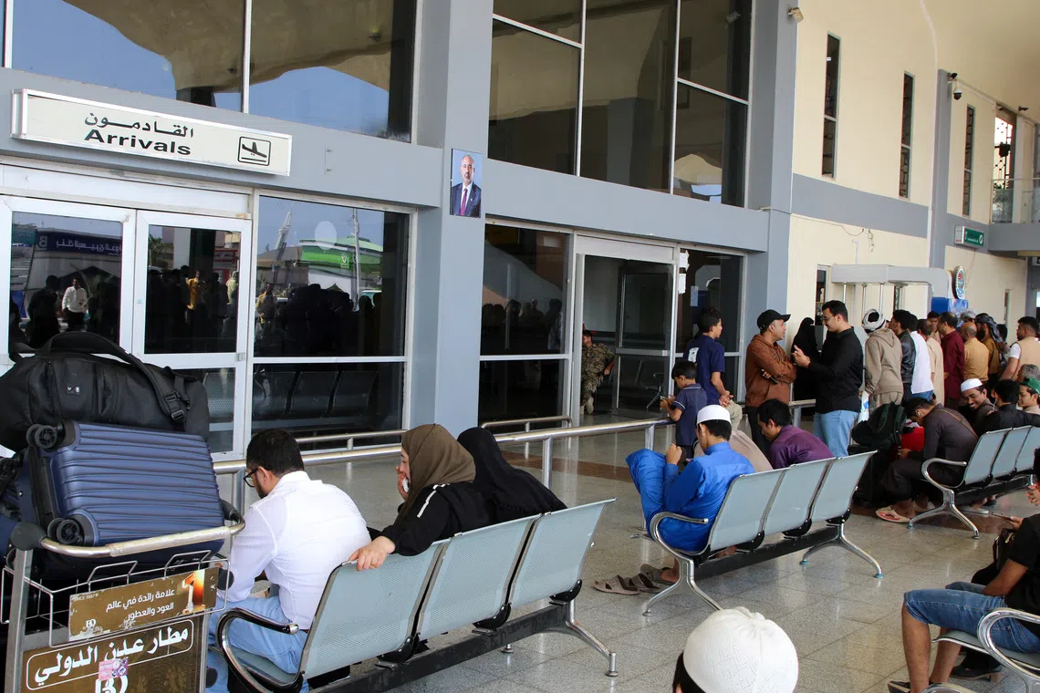 FILE PHOTO: Passengers at Aden Airport in Aden, Yemen January 1, 2026. REUTERS/Fawaz Salman/ File Photo