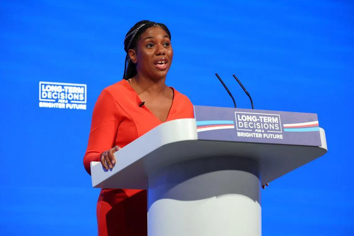FILE PHOTO: Britain's Secretary of State for Business and Trade Kemi Badenoch speaks on stage at Britain's Conservative Party's annual conference in Manchester, Britain, October 2, 2023. REUTERS/Toby Melville/File Photo