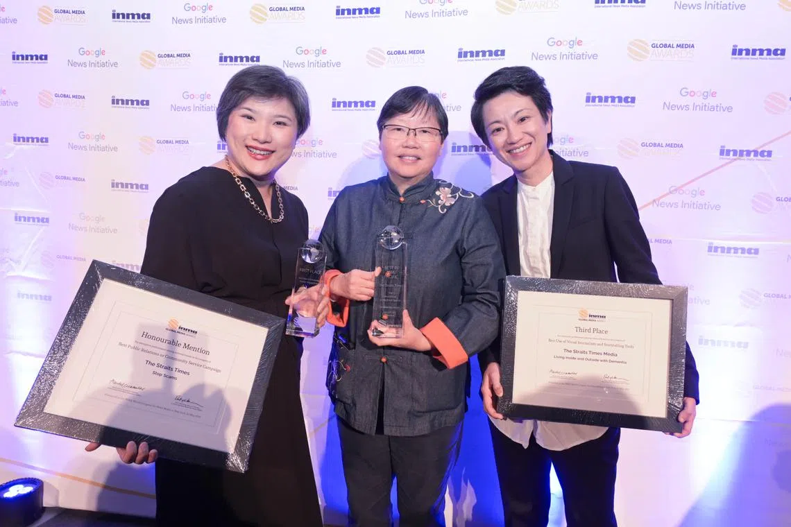 ST’s video editor E-von Yeung, ST Now editor Lee Yulin and audience growth editor Ng Kai Ling collecting the awards at the Harvard Club in New York City, on May 26.