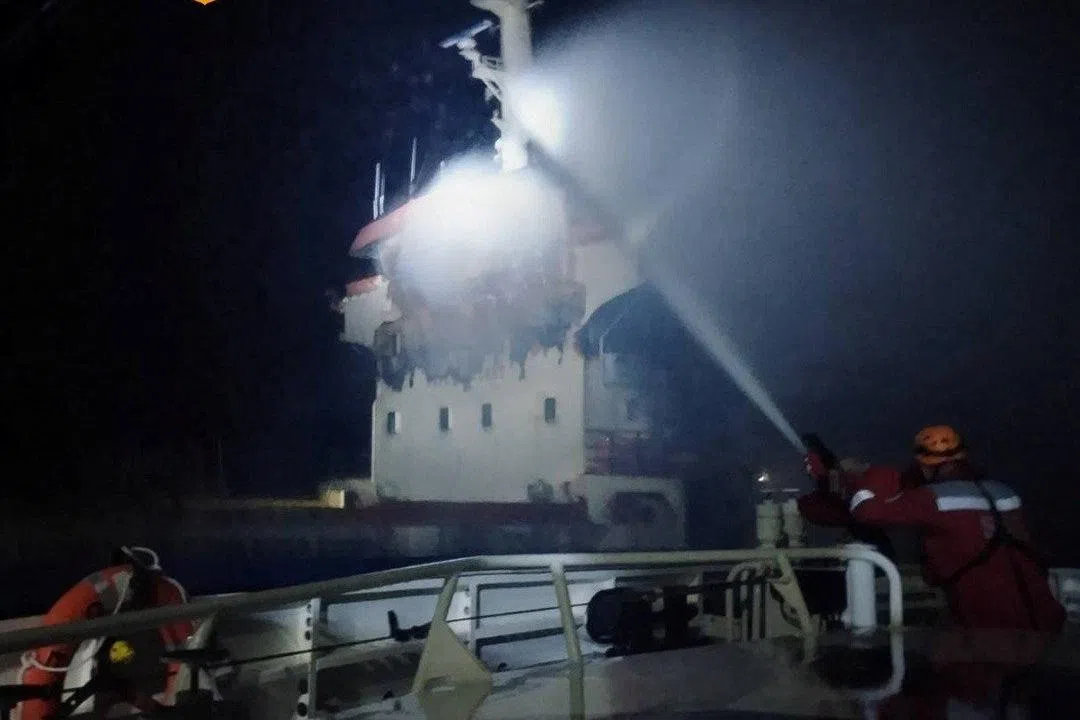 A firefighter works after a Russian drone attacked a Turkey-owned cargo ship Ant sailing under the Vanuatu flag, according to the Ukrainian navy, at the sea, in this handout image released on May 29, 2026. Ukrainian Navy/Handout via REUTERS