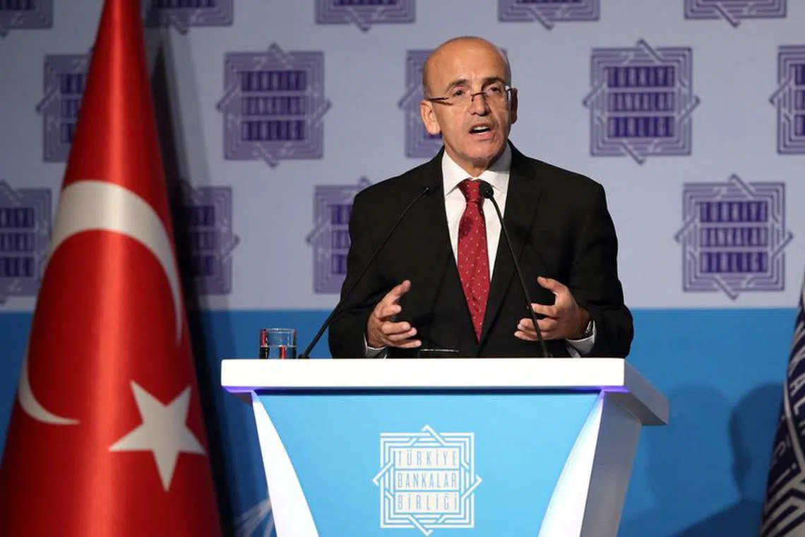 FILE PHOTO-Turkey's Finance Minister Mehmet Simsek speaks during the 66th General Assembly of Turkish Banks Association in Istanbul, Turkey August 17, 2023. REUTERS/Murad Sezer/File Photo