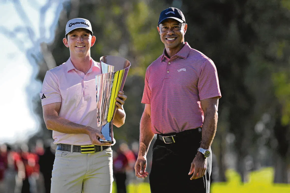 Tiger Woods (right), seen here with Jacob Bridgeman after the final round of The Genesis Invitational on Feb 22, is scheduled to appear in court on Sept 8.