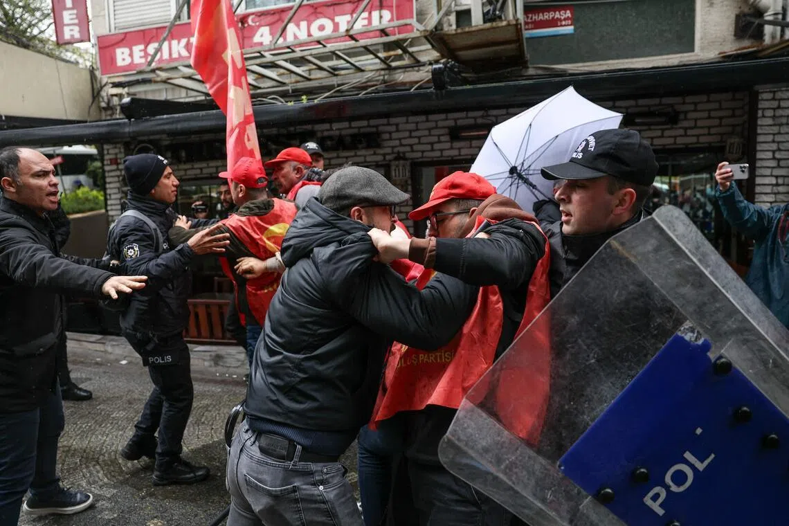 Turkish police fire tear gas, arrest dozens at May Day rallies