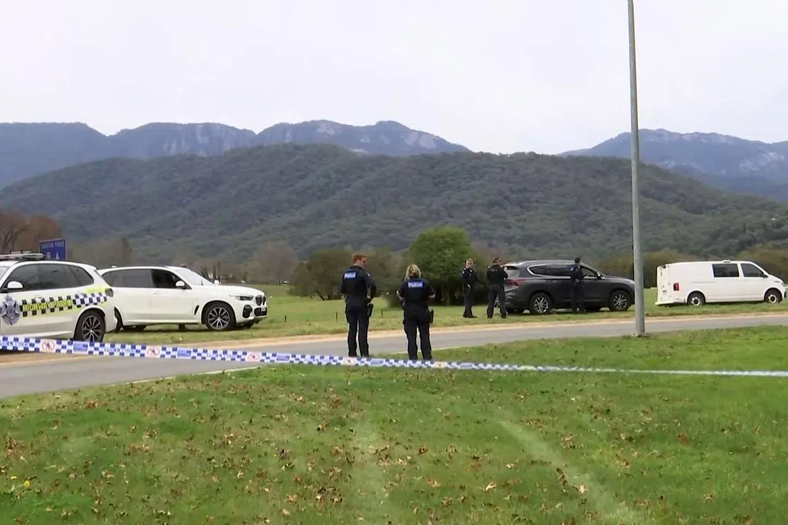 Australian police near the crime scene after the deadly confrontation with the gunman in the small town of Porepunkah in the north-east of Victoria state, Australia.  