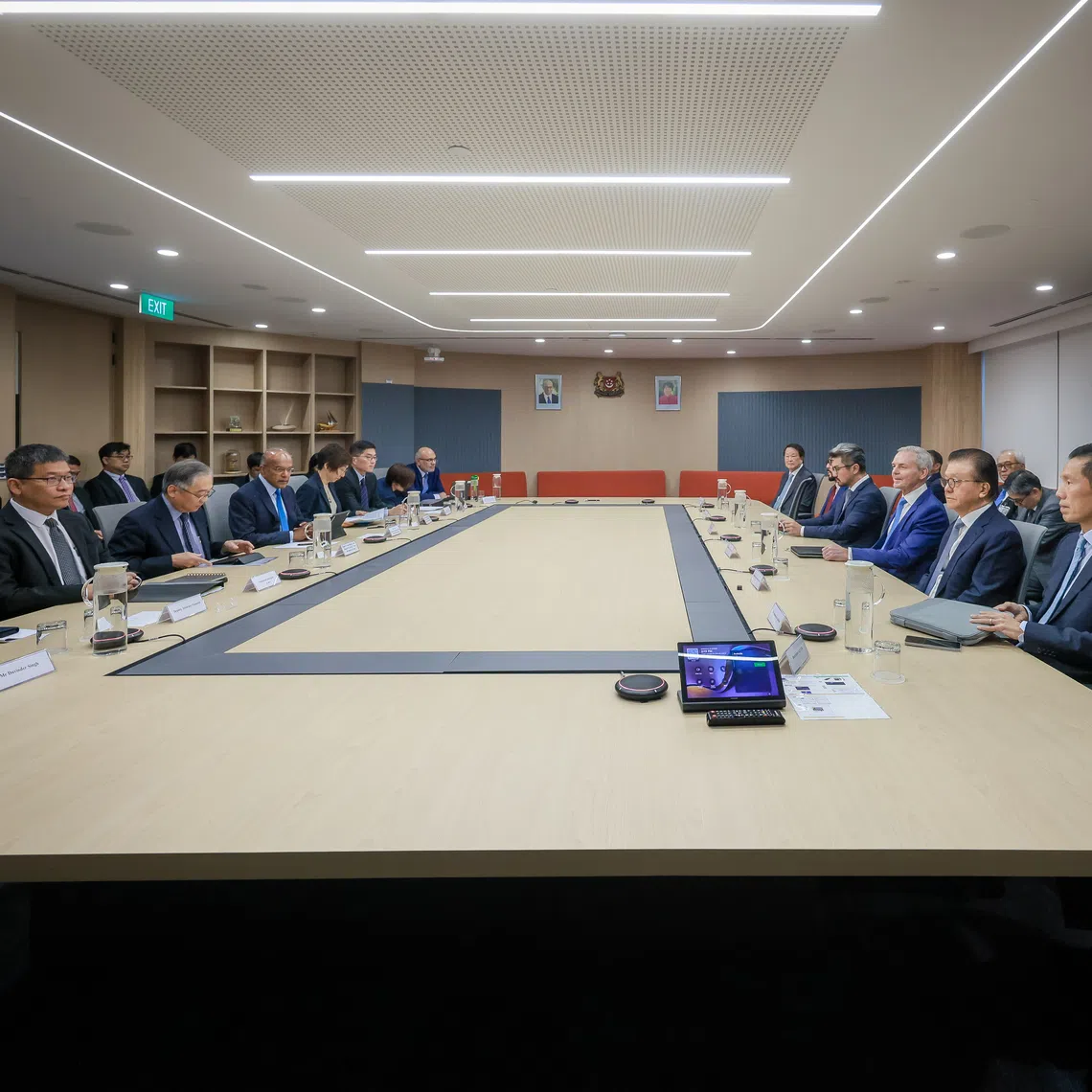 (From second from left) Deputy Prime Minister Gan Kim Yong, Senior Minister K. Shanmugam and Minister for Sustainability and the Environment Grace Fu during a meeting with various company representatives at the Treasury Building on Oct 28.