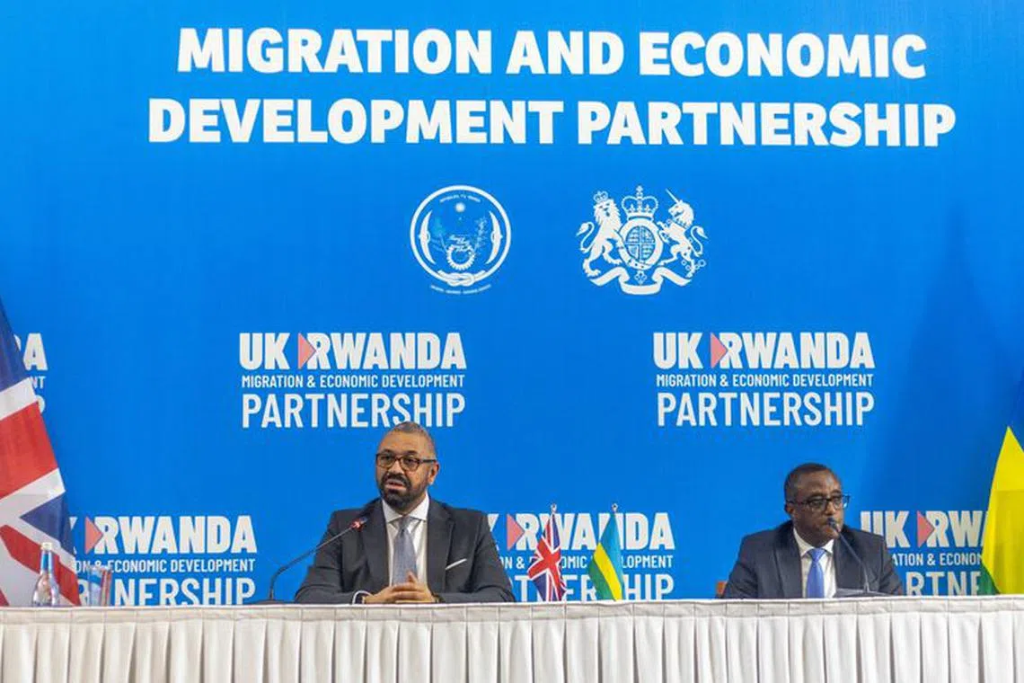 British Home Secretary James Cleverly speaks during a press conference with Rwandan Minister of Foreign Affairs Vincent Biruta after signing a new treaty, in Kigali, Rwanda, December 5, 2023. The treaty will address concerns by the Supreme Court, including assurances that Rwanda will not remove anybody transferred under the partnership to another country. REUTERS/Jean Bizimana