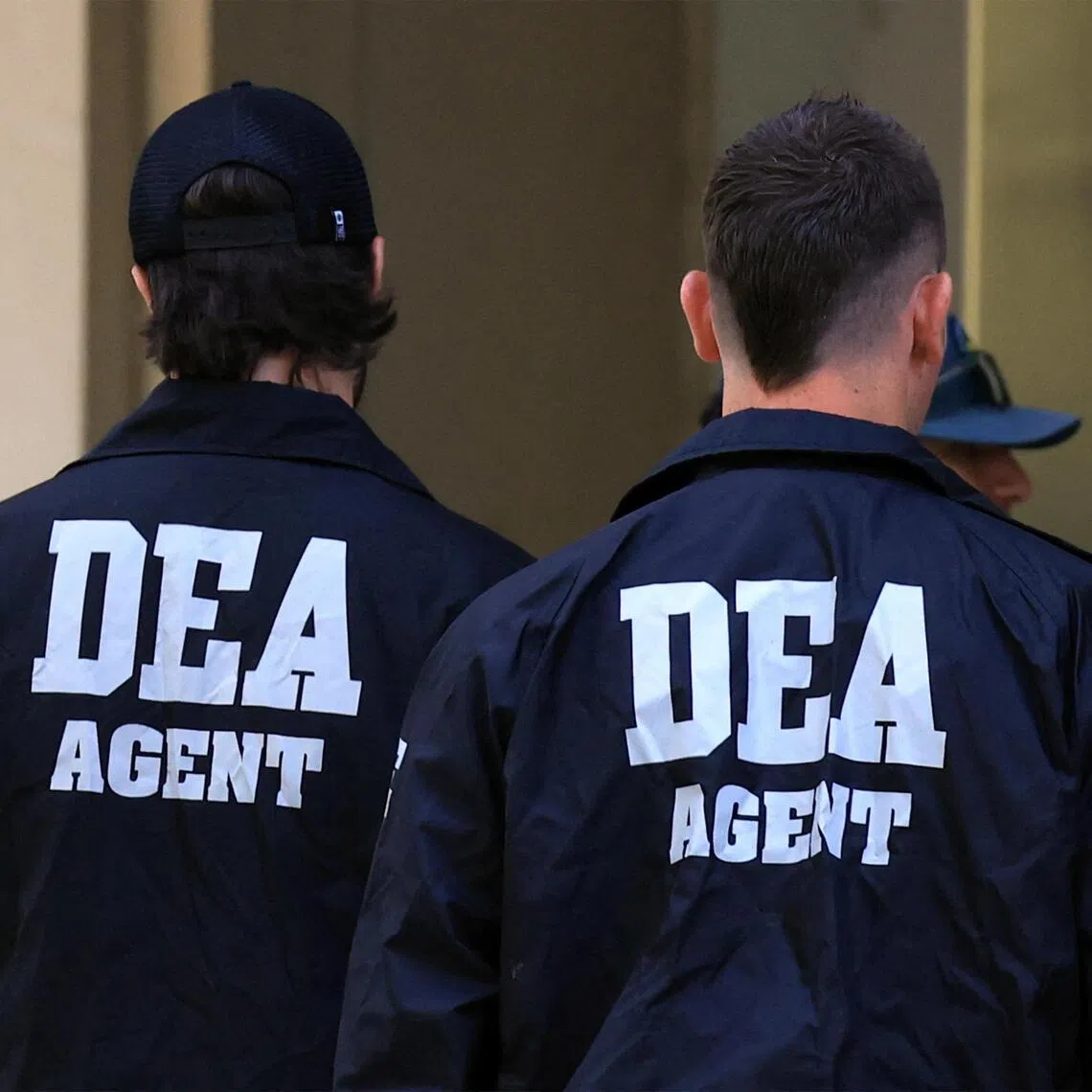 Members of the Drug Enforcement Administration (DEA) arrive to attend the sentencing hearing for Ismael "El Mayo" Zambada, the Sinaloa cartel co-founder, in Brooklyn, New York, U.S., July 20, 2026.  REUTERS/Brendan McDermid