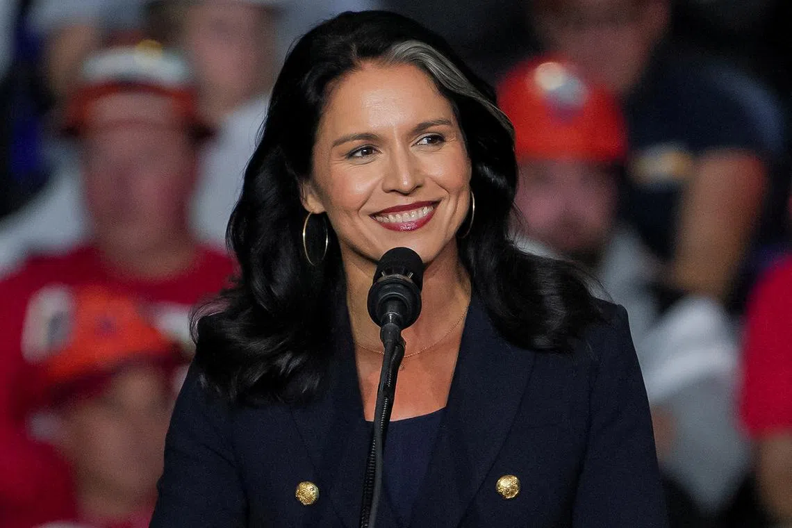 FILE PHOTO: Former U.S. Rep. Tulsi Gabbard attends a campaign rally of Republican presidential nominee and former U.S. President Donald Trump at PPG Paints Arena in Pittsburgh, Pennsylvania, U.S., November 4, 2024. REUTERS/Jeenah Moon/File Photo