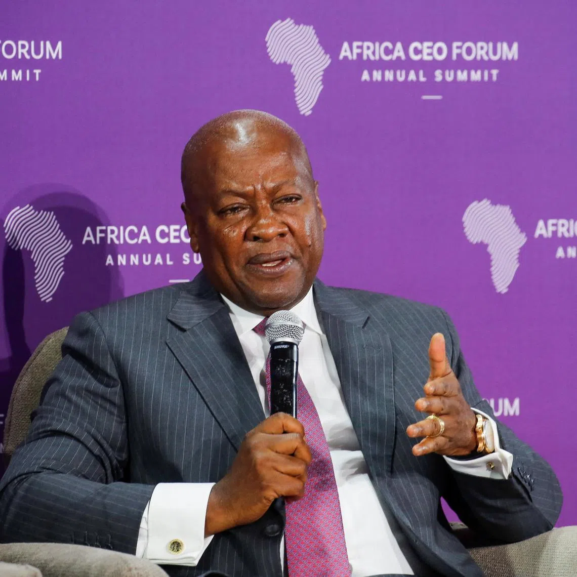 FILE PHOTO: Ghana President John Dramani Mahama speaks as he attends a panel during the Africa CEO Forum at the Sofitel Hotel Ivoire in Abidjan, Ivory Coast, May 13, 2025. REUTERS/Luc Gnago/File Photo