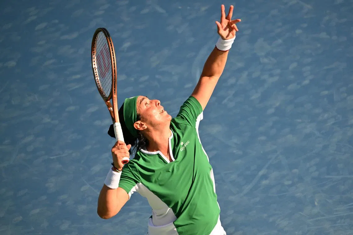 FLE PHOTO: Aug 7, 2024; Toronto, Ontario, Canada;   Ons Jabeur (TUN)  serves against Naomi Osaka (JPN, not shown) in second round play at Sobeys Stadium. Mandatory Credit: Dan Hamilton-USA TODAY Sports/File Photo