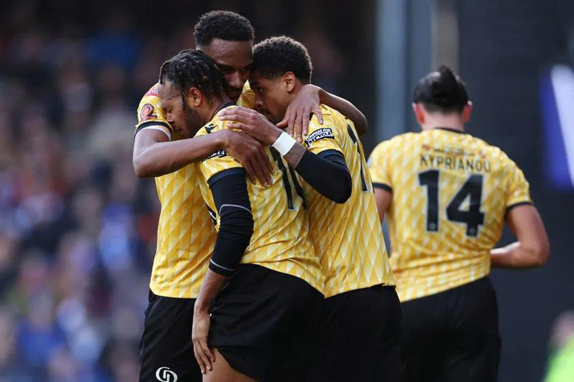 Soccer Football - FA Cup - Fourth Round - Ipswich Town v Maidstone United - Portman Road, Ipswich, Britain - January 27, 2024 Maidstone United's Lamar Reynolds celebrates scoring their first goal with teammates Action Images/Andrew Boyers